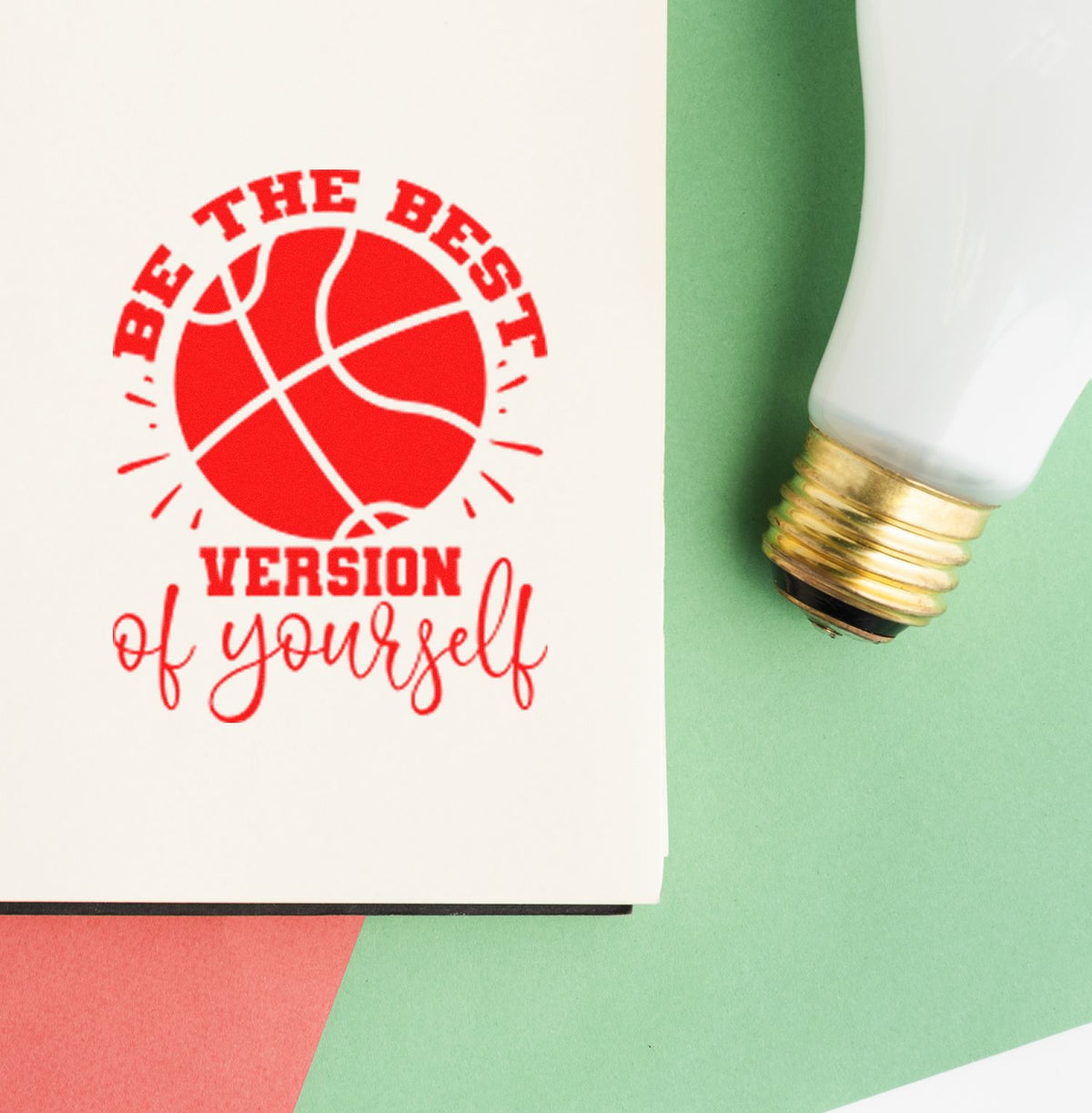 Red basketball stamp reading Be the best version of yourself beside a white-and-gold seal handle on green.