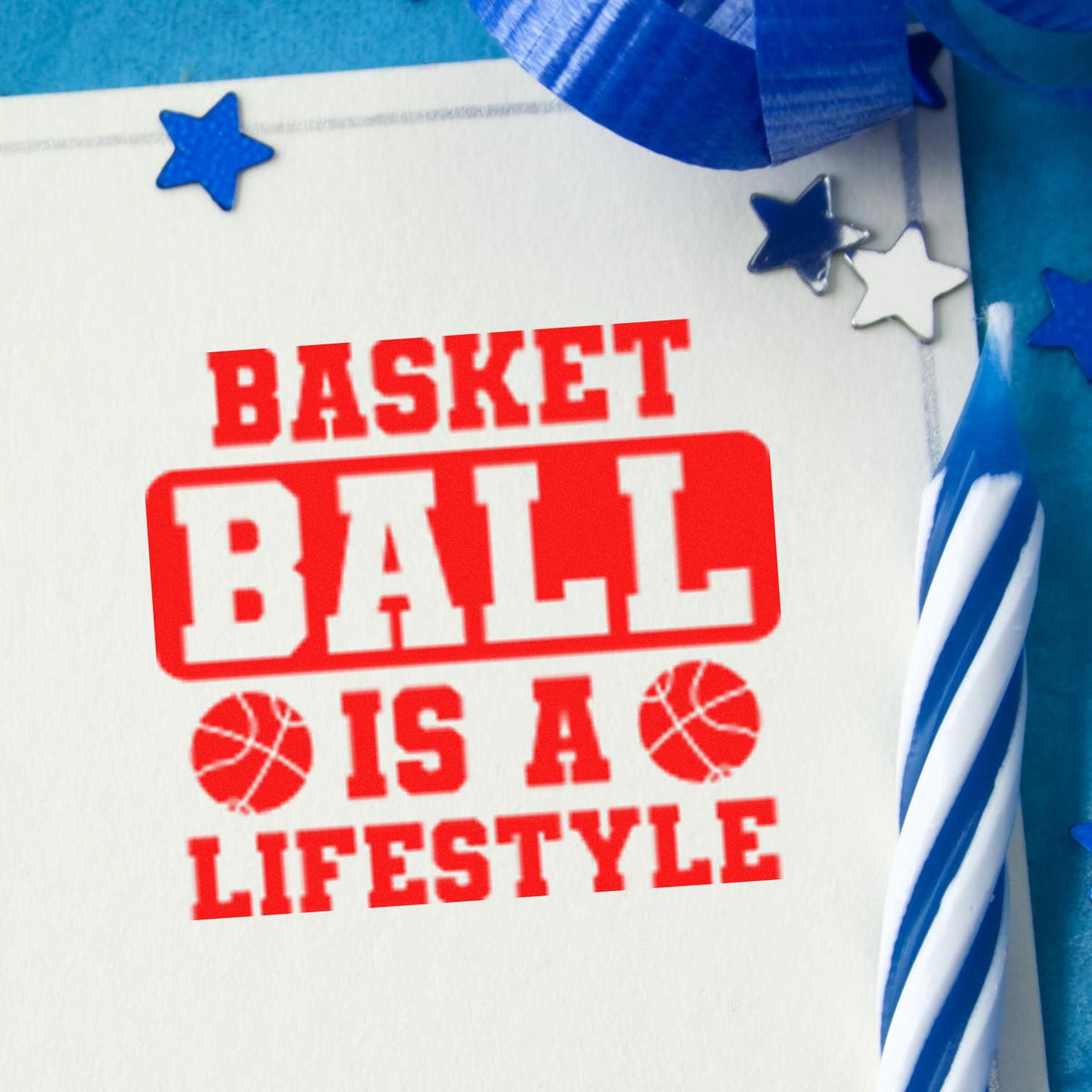 Red basketball lifestyle stamp on white card with blue stars and ribbon, festive sports seal design.