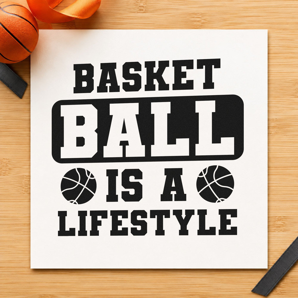Basketball Is A Lifestyle craft stamp imprint in black ink on a handmade project, one idea being paint kit gift tags.