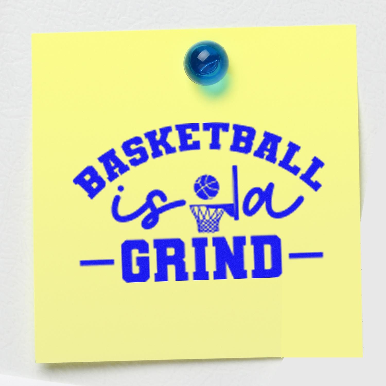 Blue basketball stamp reading is a grind on a yellow sticky note, pinned with a blue push pin.
