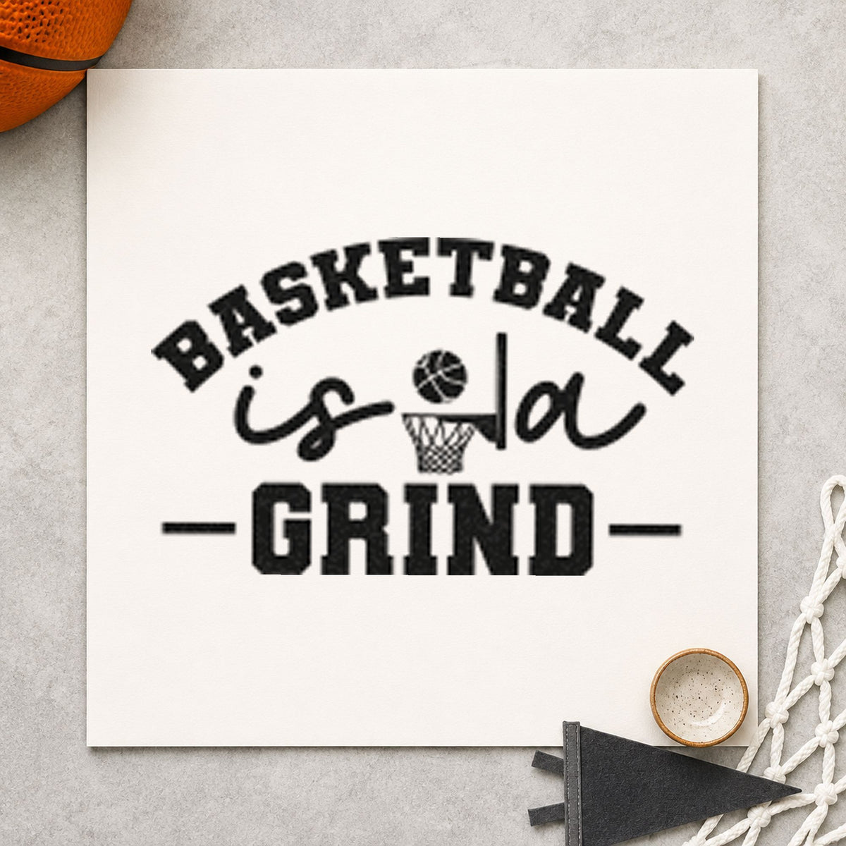 Basketball Is A Grind craft stamp imprint in black ink on a handmade project, one idea being rebounder gift tags.