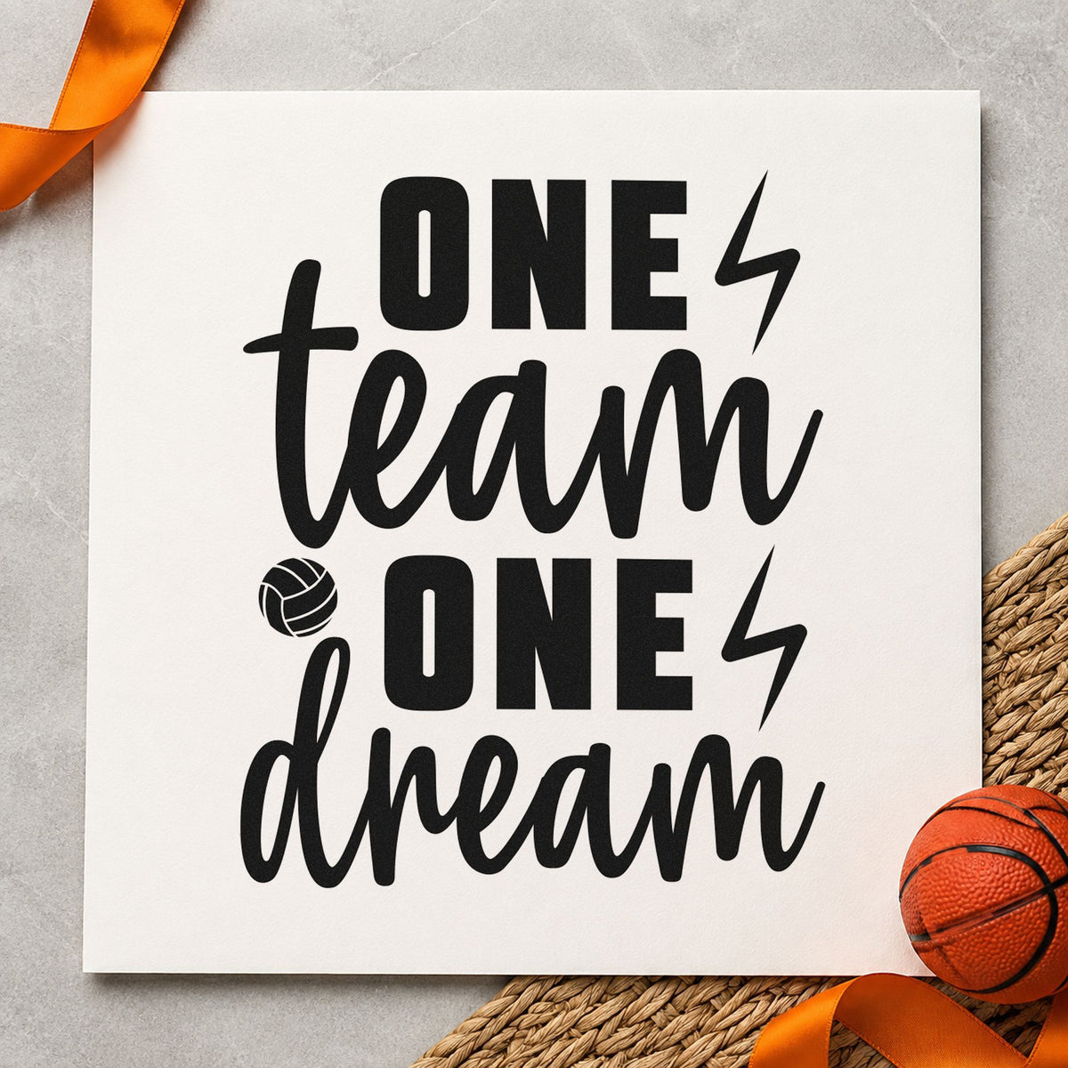 One Team One Dream craft stamp imprint in black ink on a handmade project, one idea being after game gift tags.