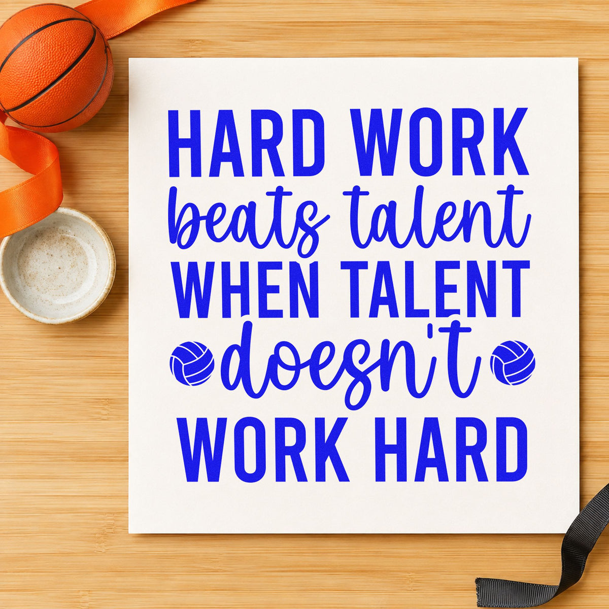 Hard Work Beats Talent craft stamp imprinted in blue ink on paper, a design suited to framed camp gym.
