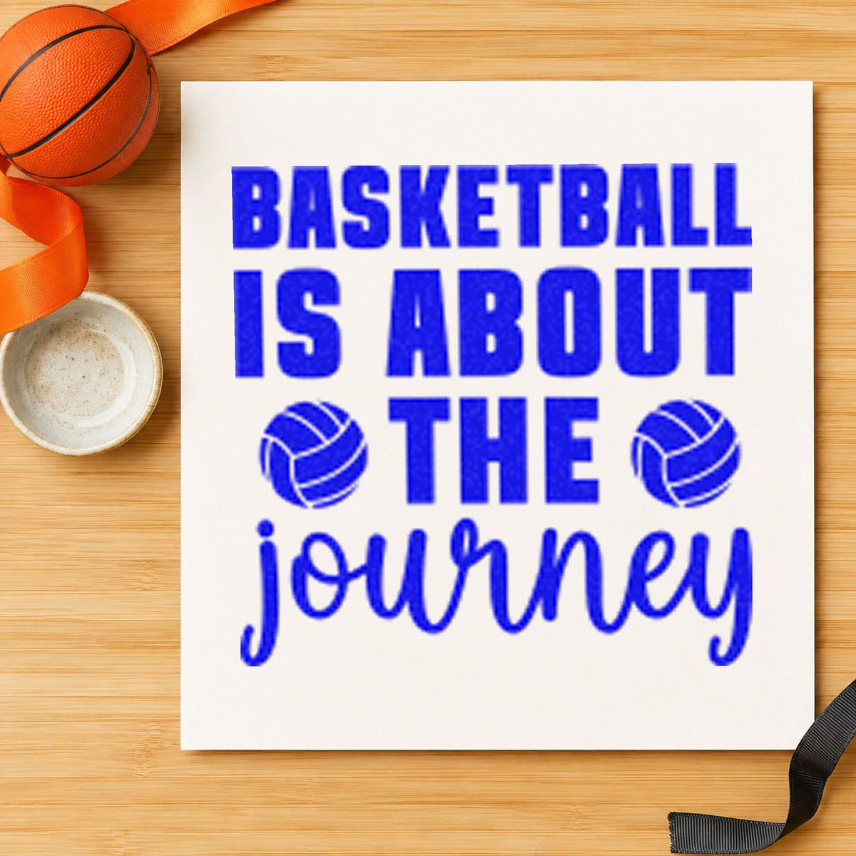 Basketball About The Journey craft stamp in blue ink on cardstock, an easy option for table cloth printing.