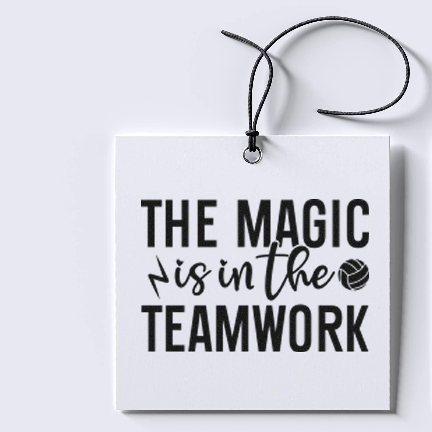 Black custom stamp on white hanging tag, reading The magic is in the teamwork with a volleyball icon.