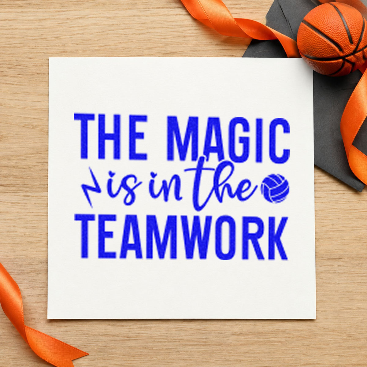 Magic Is In Teamwork craft stamp imprinted in blue ink on paper, a design suited to framed officials room.