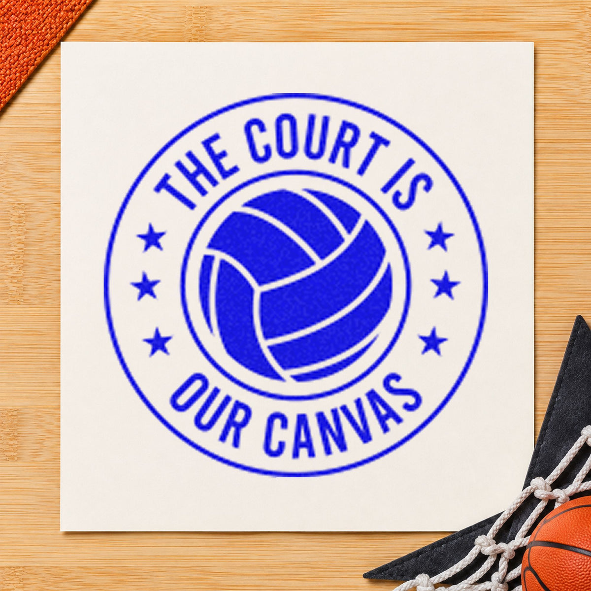 Court Our Canvas Badge craft stamp in blue ink on cardstock, an easy option for camera bag printing.