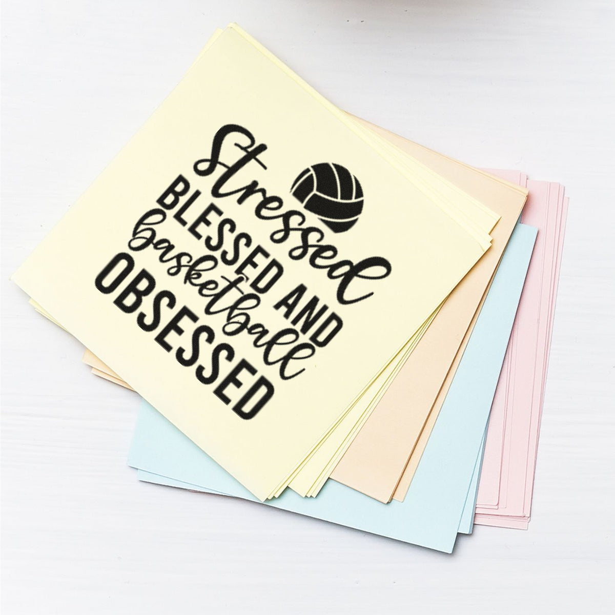 Pastel stamp and seal samples on cream, blue, pink and beige cards with bold black Stressed, Blessed and Obsessed design.