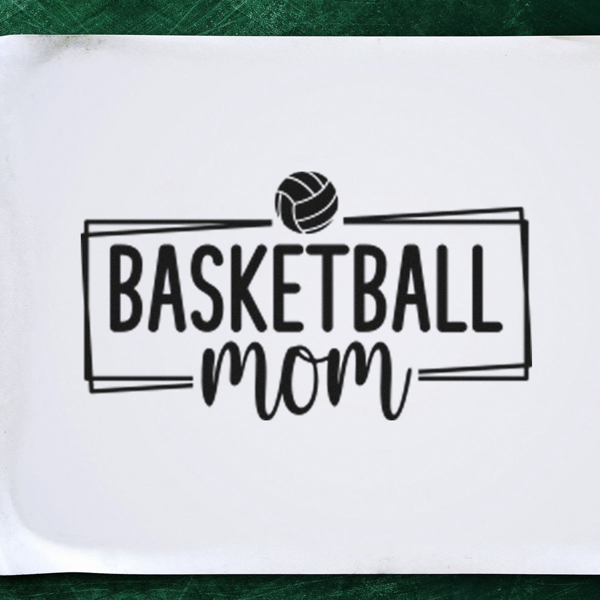 Black basketball mom stamp and seal with basketball icon in a rectangular frame on white background