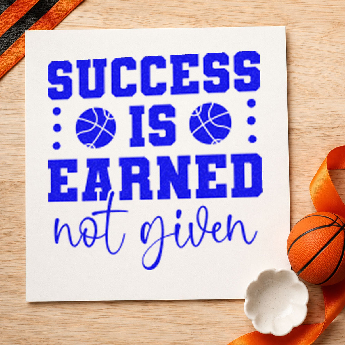 Success Earned Not Given craft stamp in blue ink on cardstock, an easy option for line mat printing.