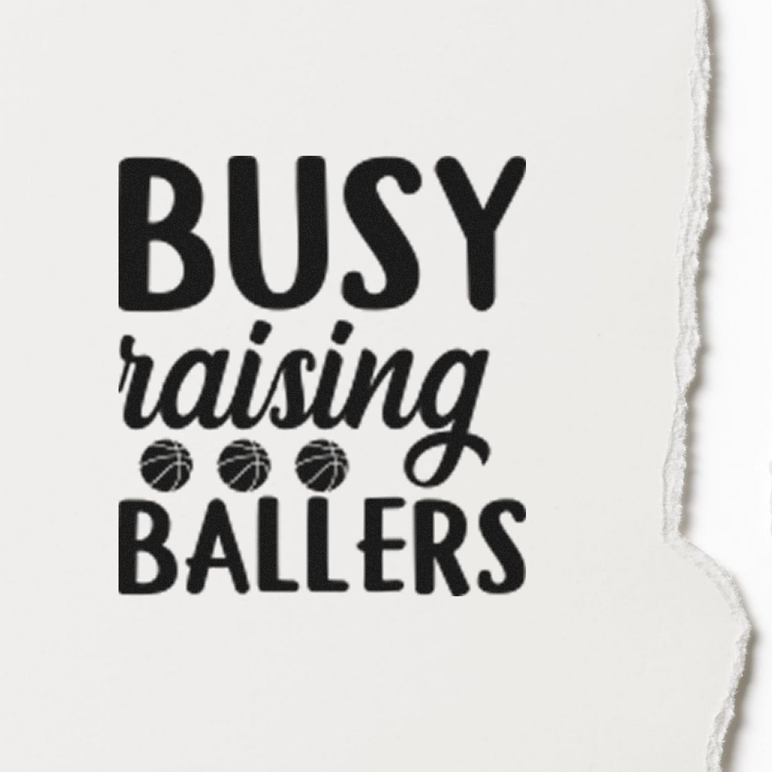 Black custom stamp reading Busy raising ballers with basketball icons on white torn-edge paper.
