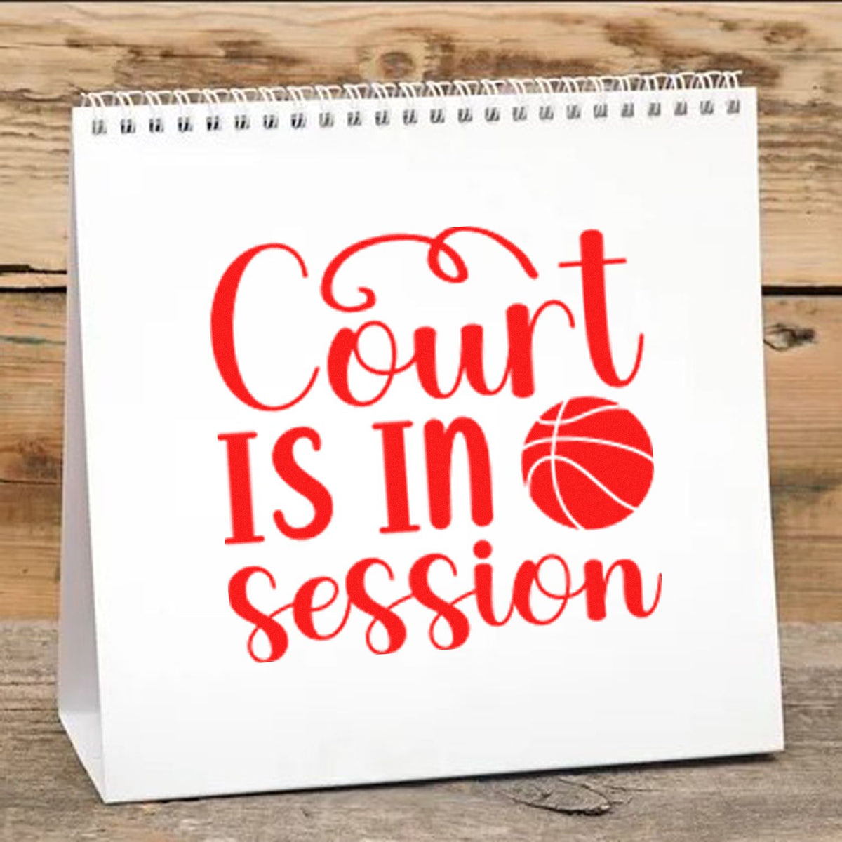 Custom red stamp and seal reading Court is in session with basketball icon on a white spiral-bound display bag.