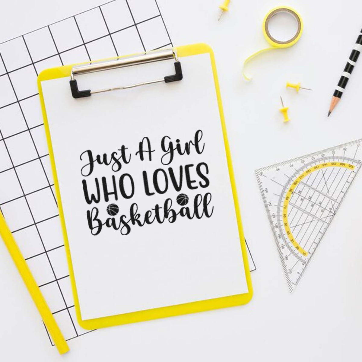 Basketball-themed stamp and seal on yellow clipboard, with black text, grid paper, protractor, and pencil.