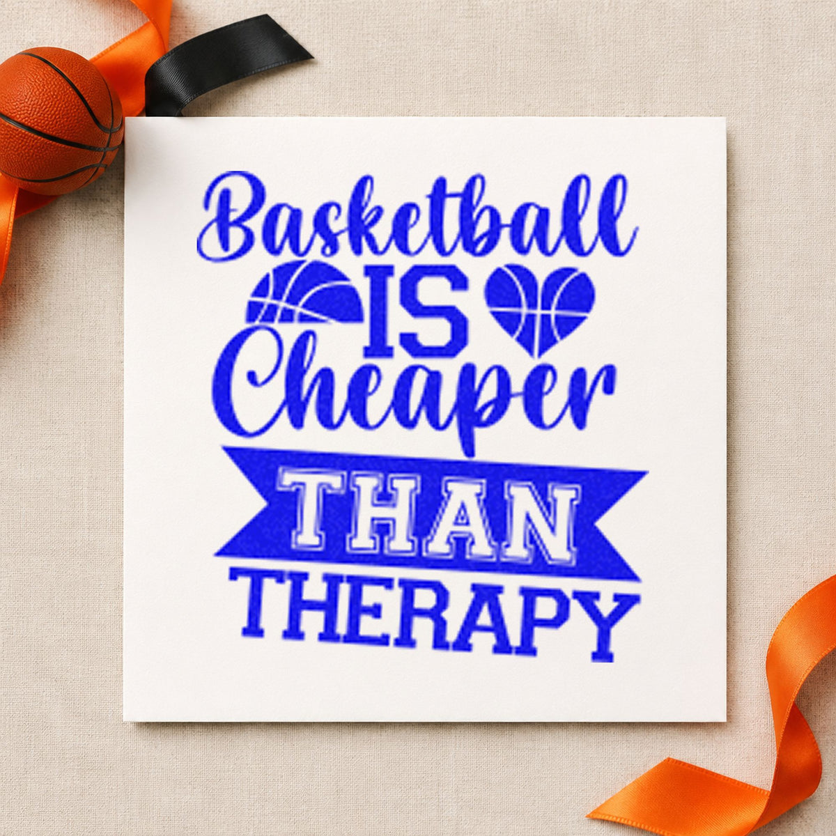 Basketball Cheaper Than Therapy craft stamp in blue ink on cardstock, an easy option for league tee printing.