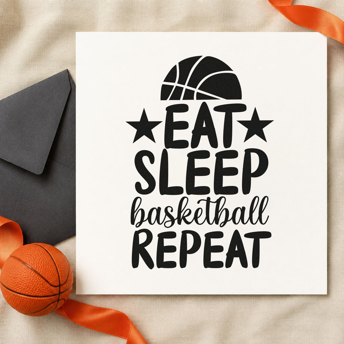 Eat Sleep Basketball Repeat craft stamp imprint in black ink on a handmade project, one idea being water jug gift tags.