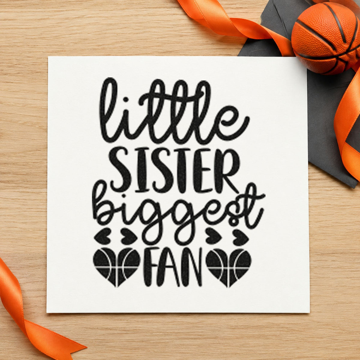 Little Sister Biggest Fan craft stamp imprint in black ink on a handmade project, one idea being party bag gift tags.