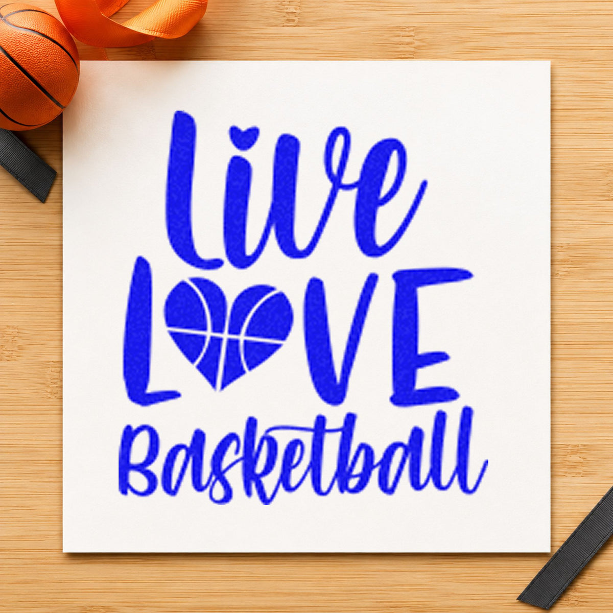 Live Love Basketball Heart craft stamp in blue ink on cardstock, an easy option for table skirt printing.