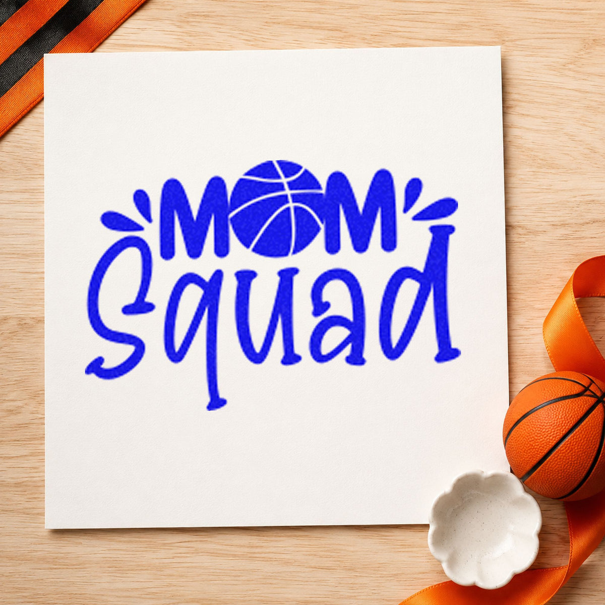 Basketball Mom Squad Lettering craft stamp imprinted in blue ink on paper, a design suited to framed gym foyer.