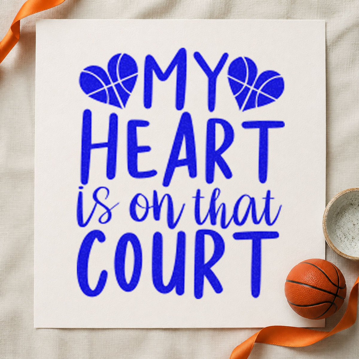Heart On That Court craft stamp in blue ink on cardstock, an easy option for car blanket printing.