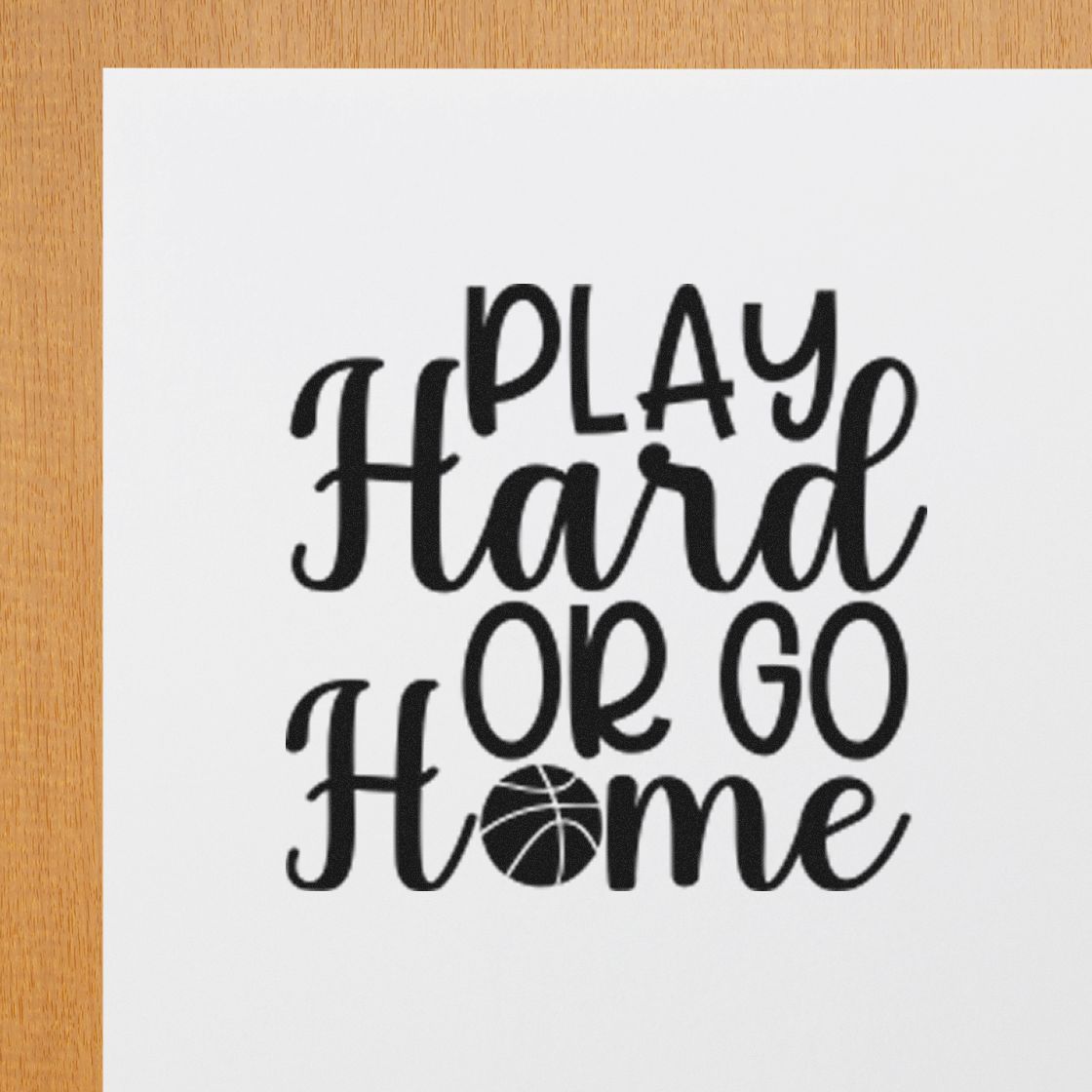 Black custom stamp/seal reading Play Hard or Go Home with a basketball icon on white paper.