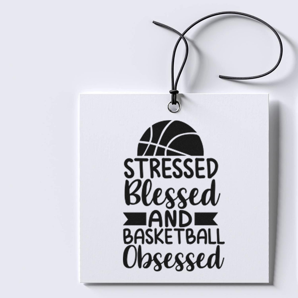 Black custom stamp seal tag with basketball graphic and Stressed Blessed and Basketball Obsessed on a white background.
