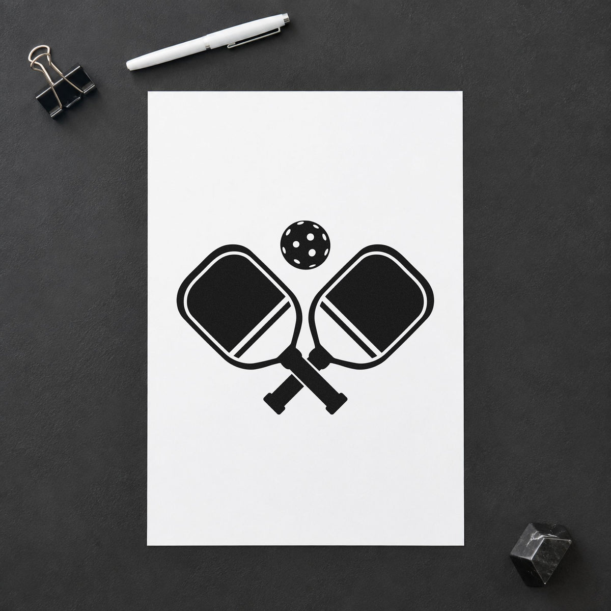 Crossed Pickleball Paddles Ball rubber stamp printed in black ink, ready for court book sheet and similar paper crafts.