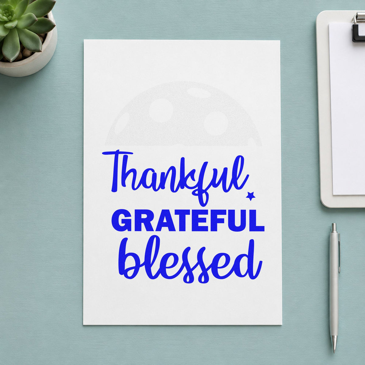 Thankful Grateful Blessed Script craft stamp imprinted in blue ink on paper, a design suited to framed hall entry.