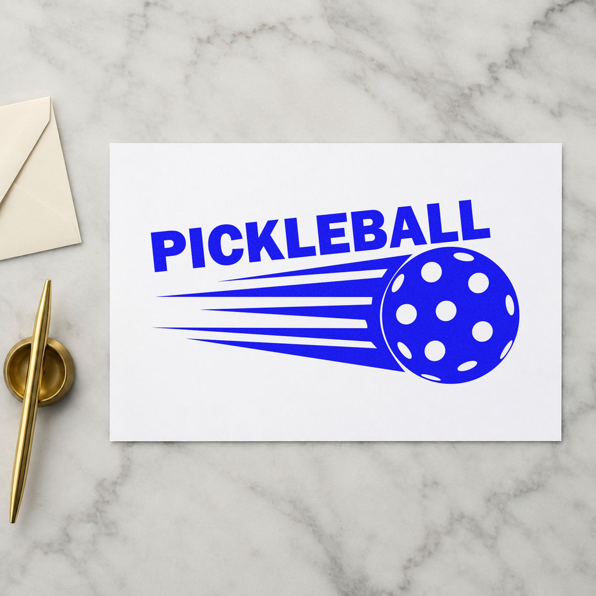 Pickleball Speeding Ball Graphic craft stamp in blue ink on cardstock, an easy option for coach shirt printing.