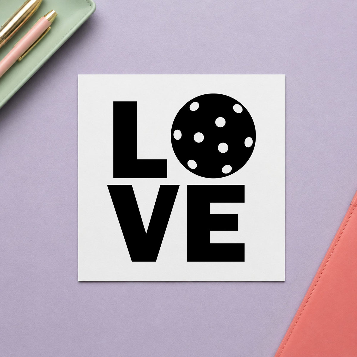 Stacked Love Pickleball Ball craft stamp imprint in black ink on a handmade project, one idea being favor bag gift tags.