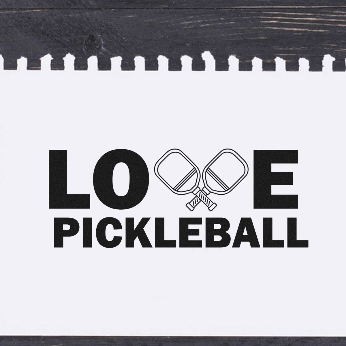 Black-and-white pickleball stamp seal with bold LOVE PICKLEBALL text and crossed paddles icon.