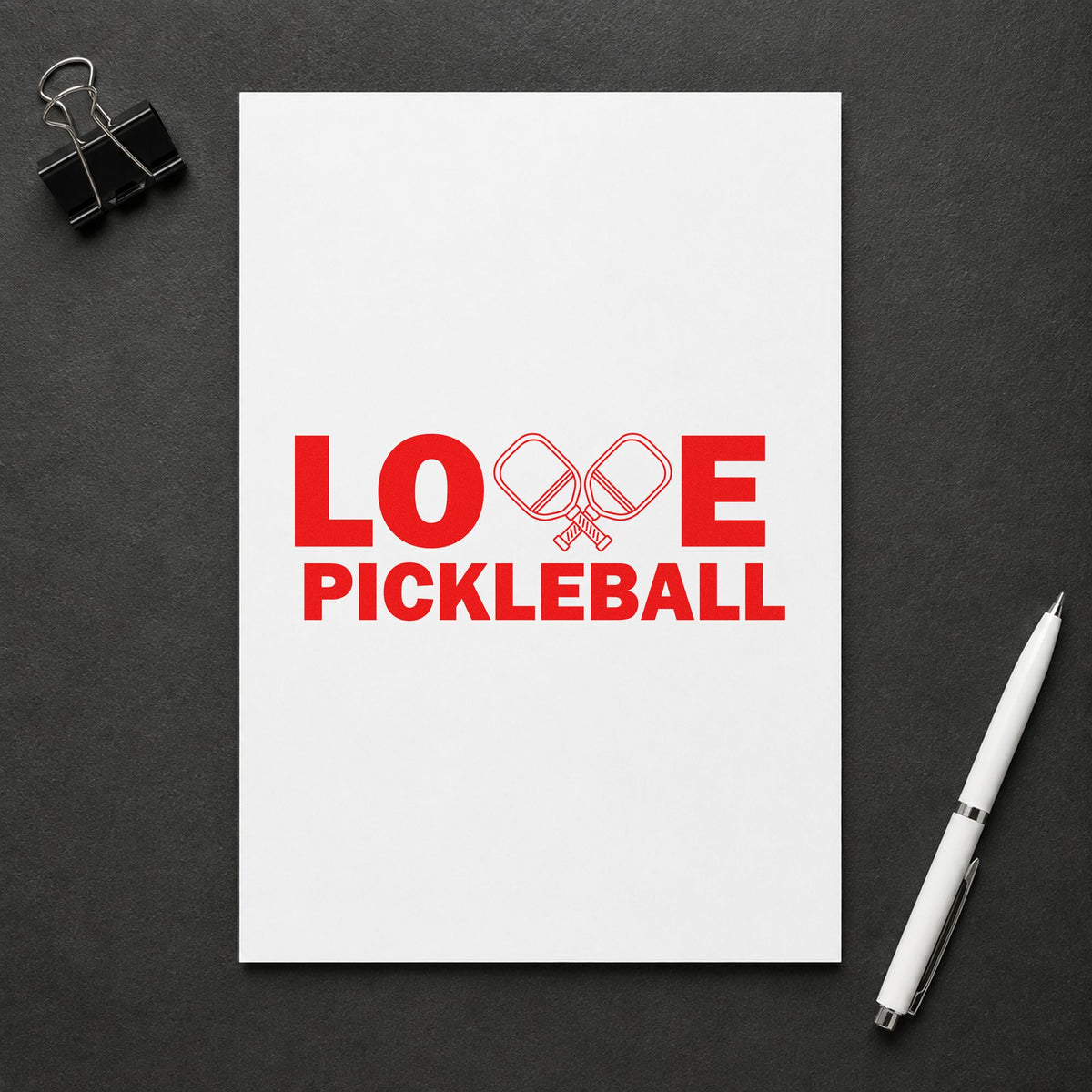 Love Pickleball Crossed Paddles craft stamp imprint in red ink on a handmade project, one idea being demo note cards.