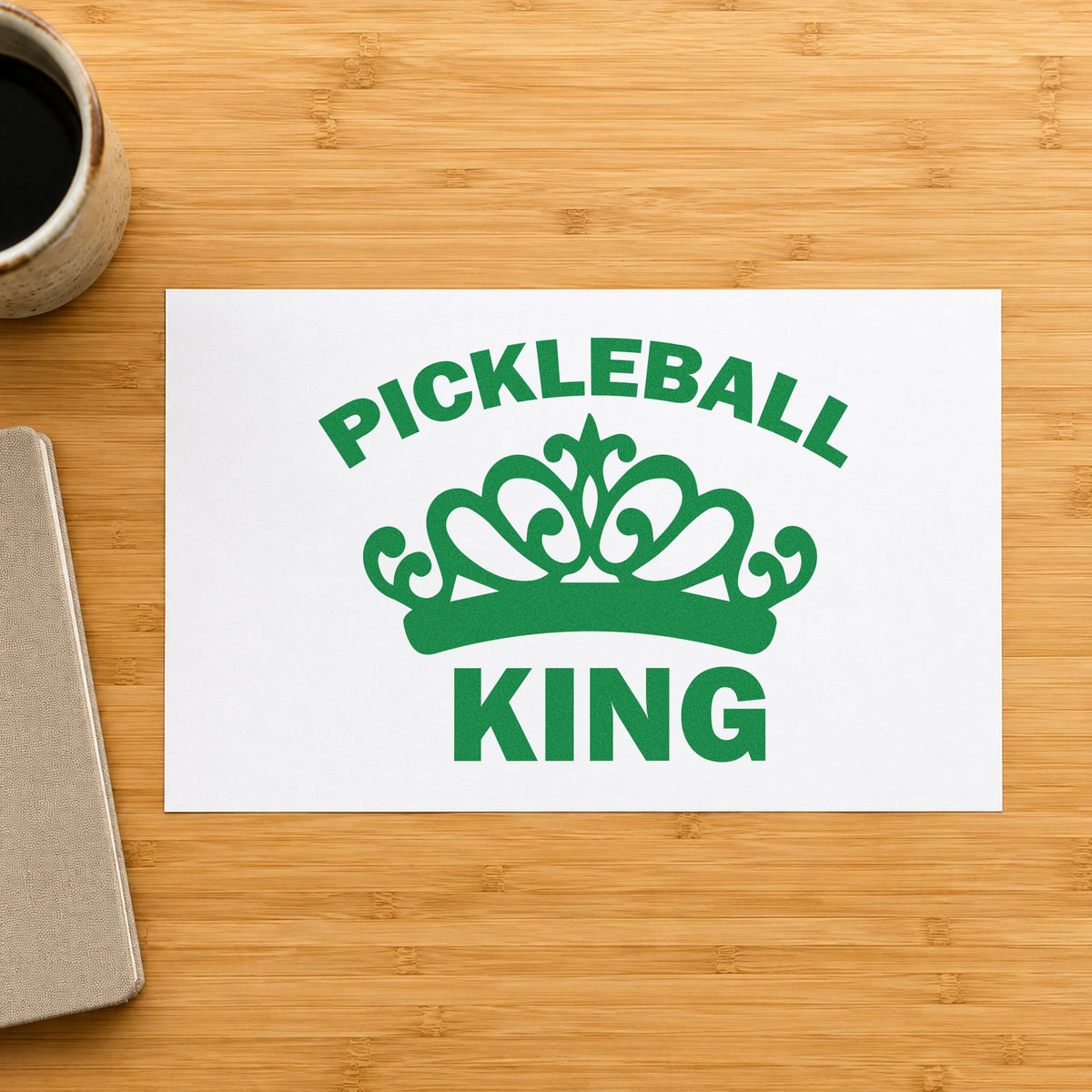 Pickleball King Crown Graphic craft stamp imprint in green ink on a handmade project, one idea being strategy note cards.