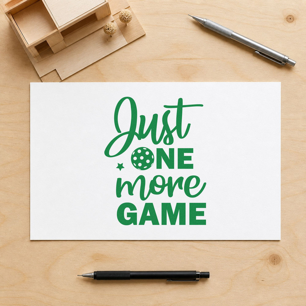 Just One More Game craft stamp in green ink on cardstock, an easy option for open play album page.