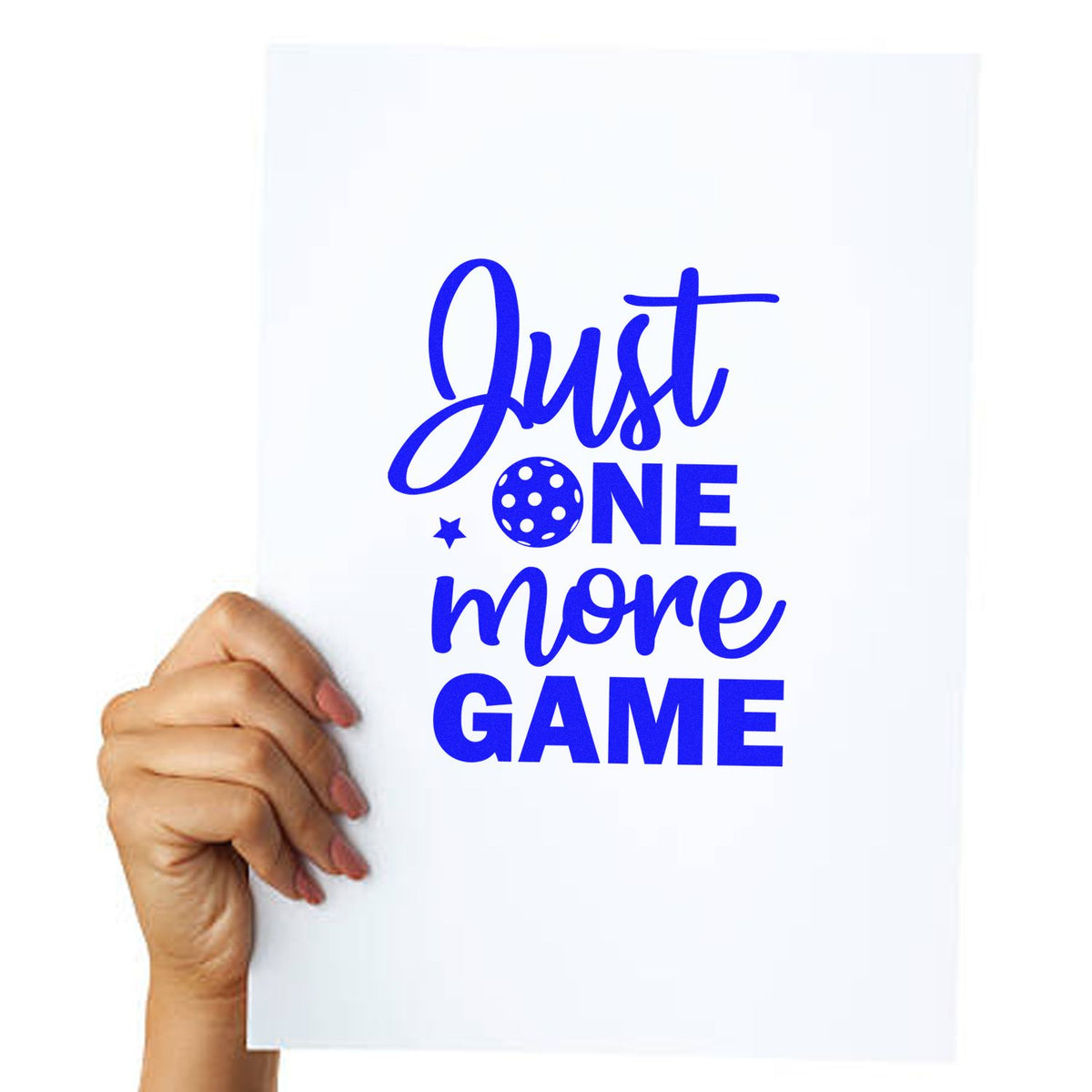Custom stamp and seal design on a white card, blue Just One More Game text, held by a hand.