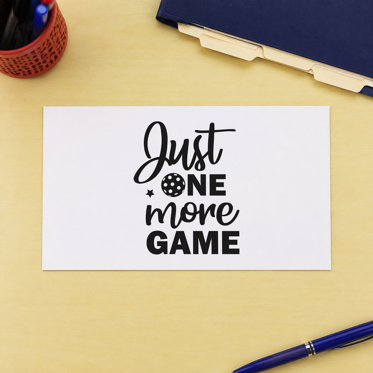 Just One More Game craft stamp imprint in black ink on a handmade project, one idea being visitor pass gift tags.