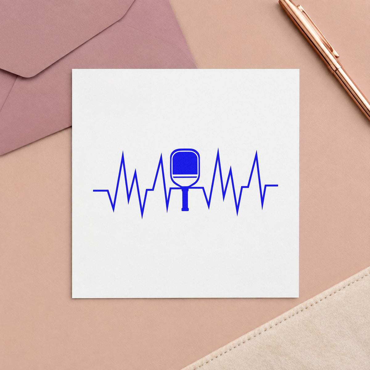Solid Paddle Heartbeat Line craft stamp imprinted in blue ink on paper, a design suited to framed demo tent.