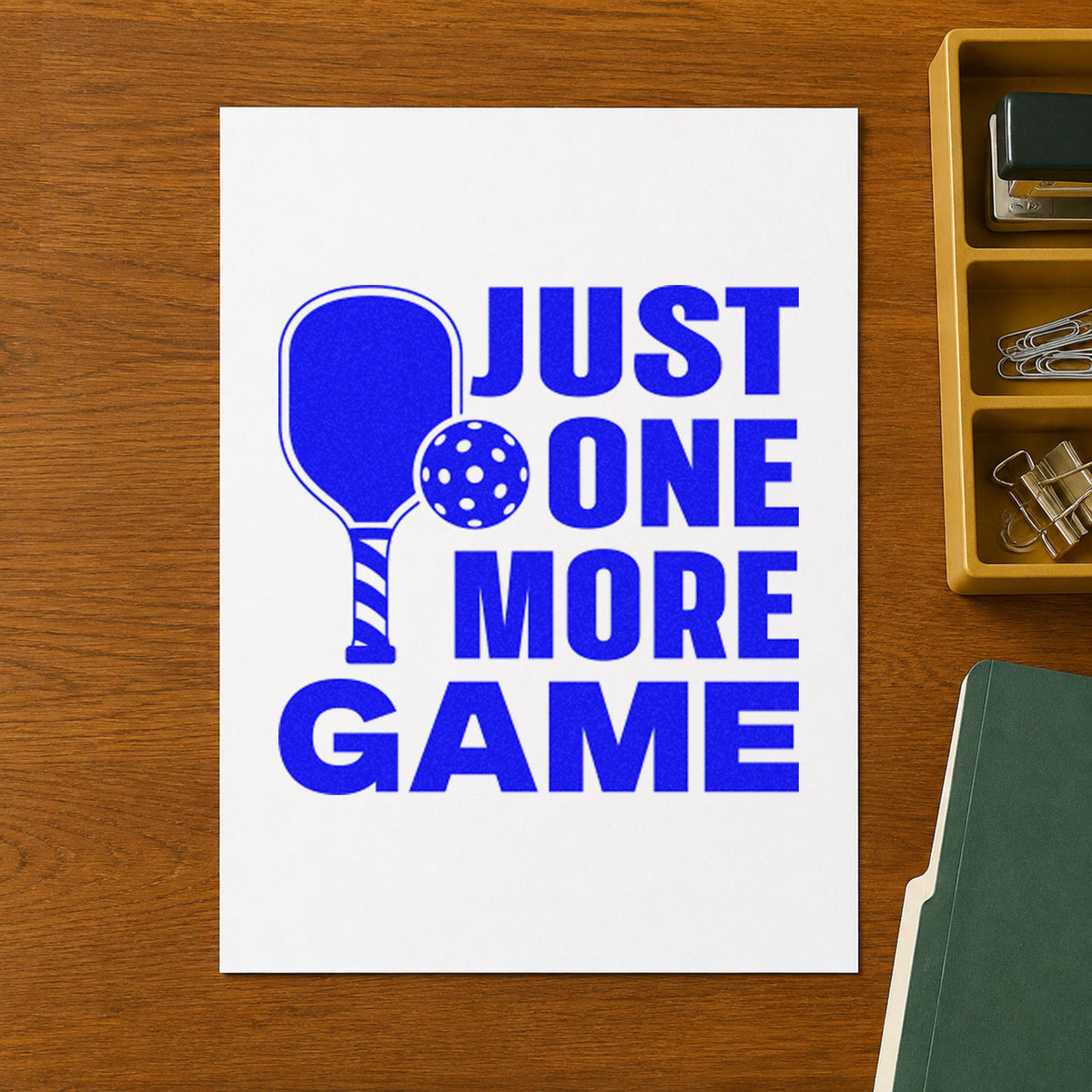 Just One More Game craft stamp in blue ink on cardstock, an easy option for kit bag printing.