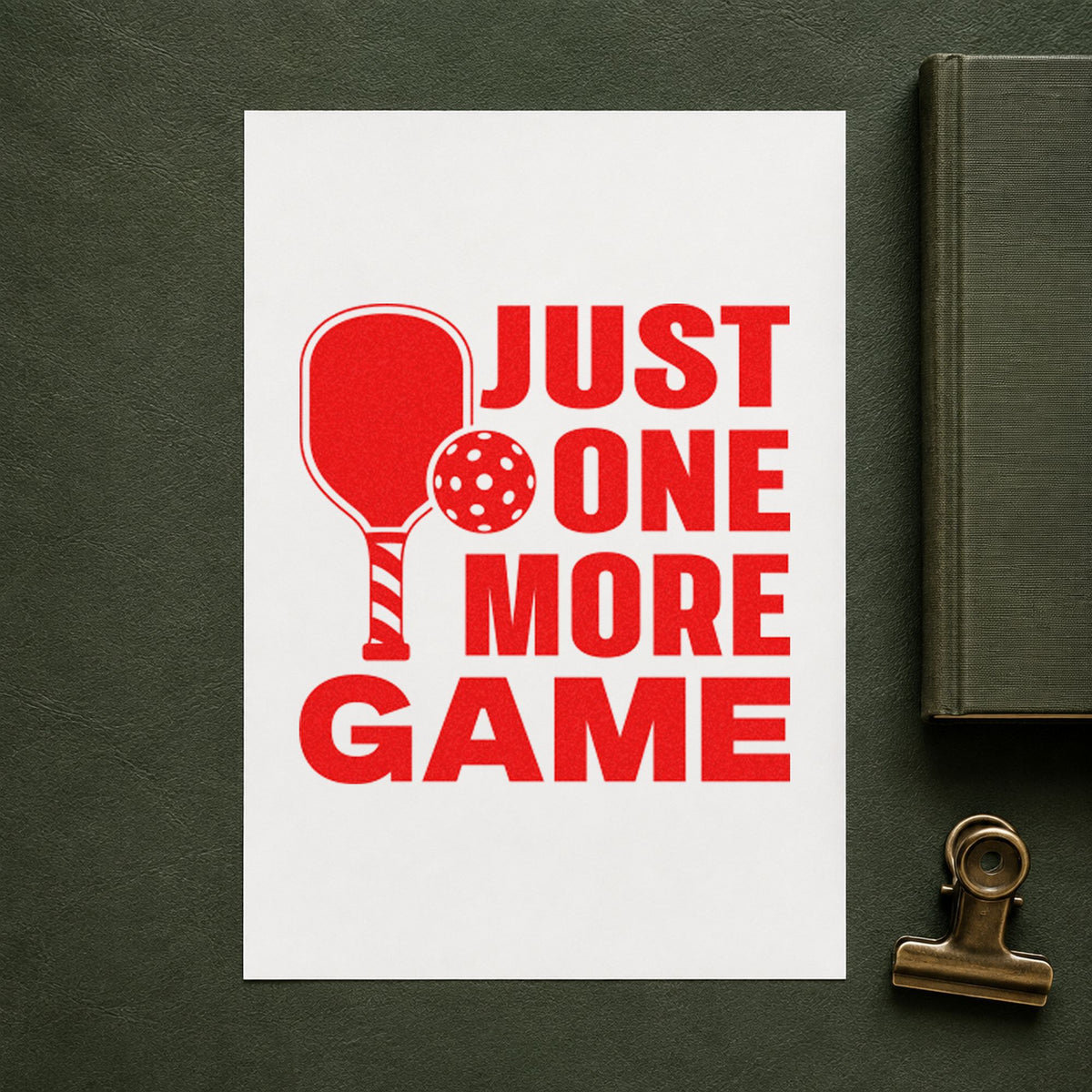 Just One More Game rubber stamp shown in red ink, stamped for projects such as bin change labels.