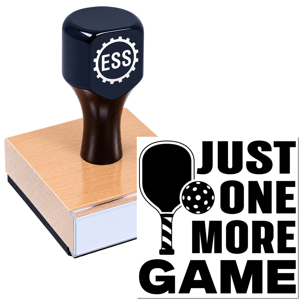 Black rubber stamp on wooden base with ESS logo and "JUST ONE MORE GAME" paddle graphic on white background