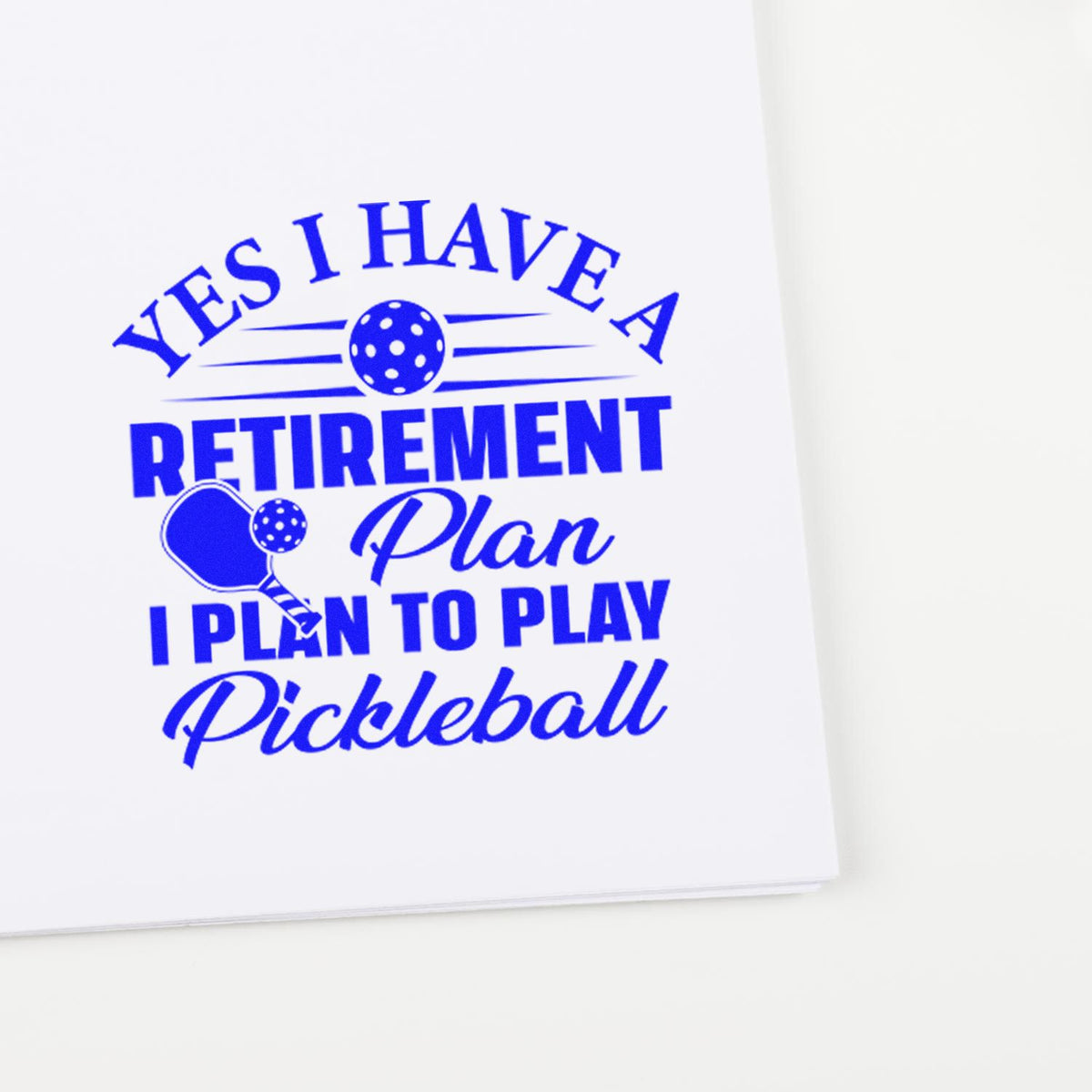 Blue pickleball retirement stamp design with paddle and ball, reading Yes I Have a Retirement Plan I Plan to Play Pickleball
