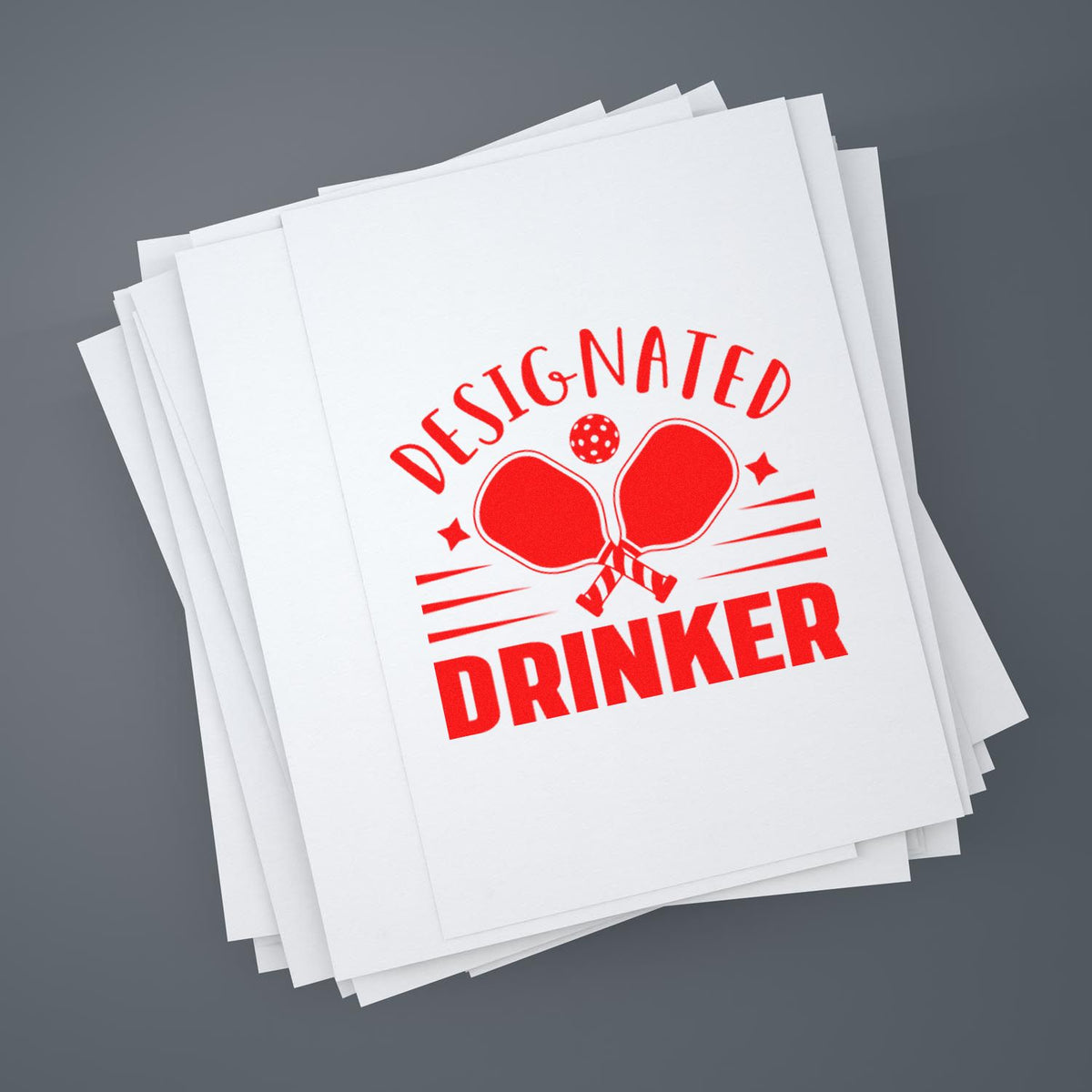 Stack of white stamp and seal sheets with a red Designated Drinker imprint and ping-pong paddle graphic on gray background