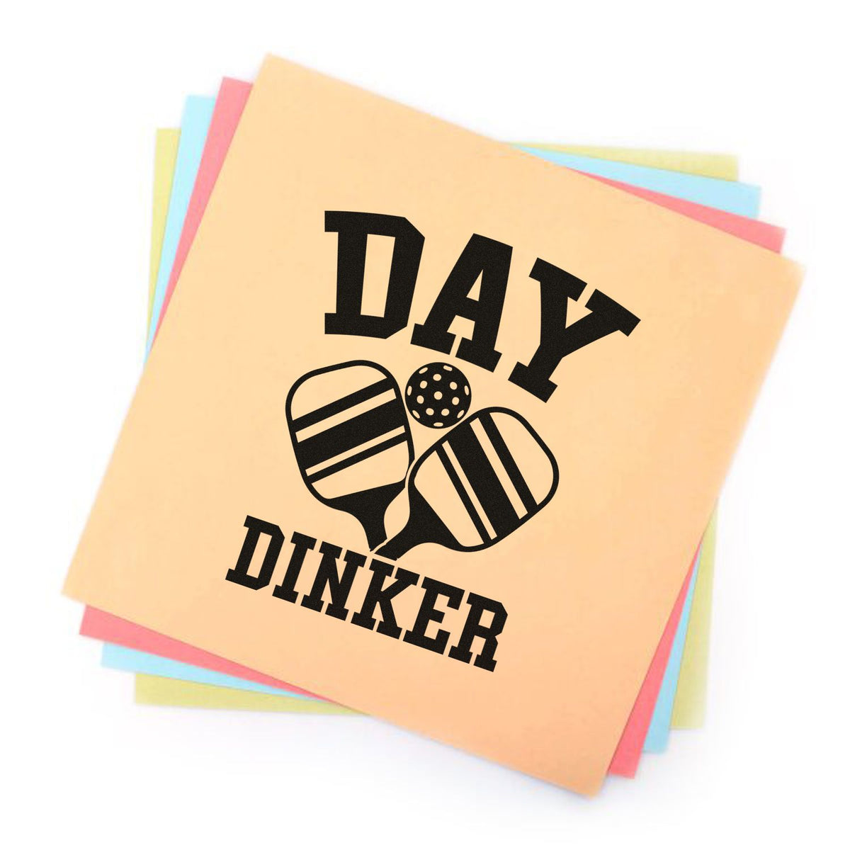 Pastel stamp and seal sheets with black Day Dinker pickleball paddles logo on stacked paper cards.