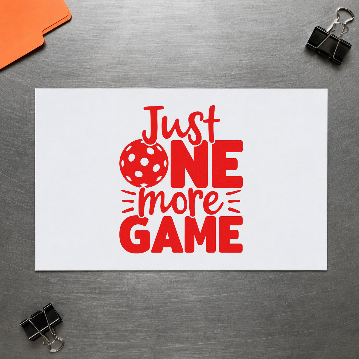 Just One More Game craft stamp imprint in red ink on a handmade project, one idea being last game cards.