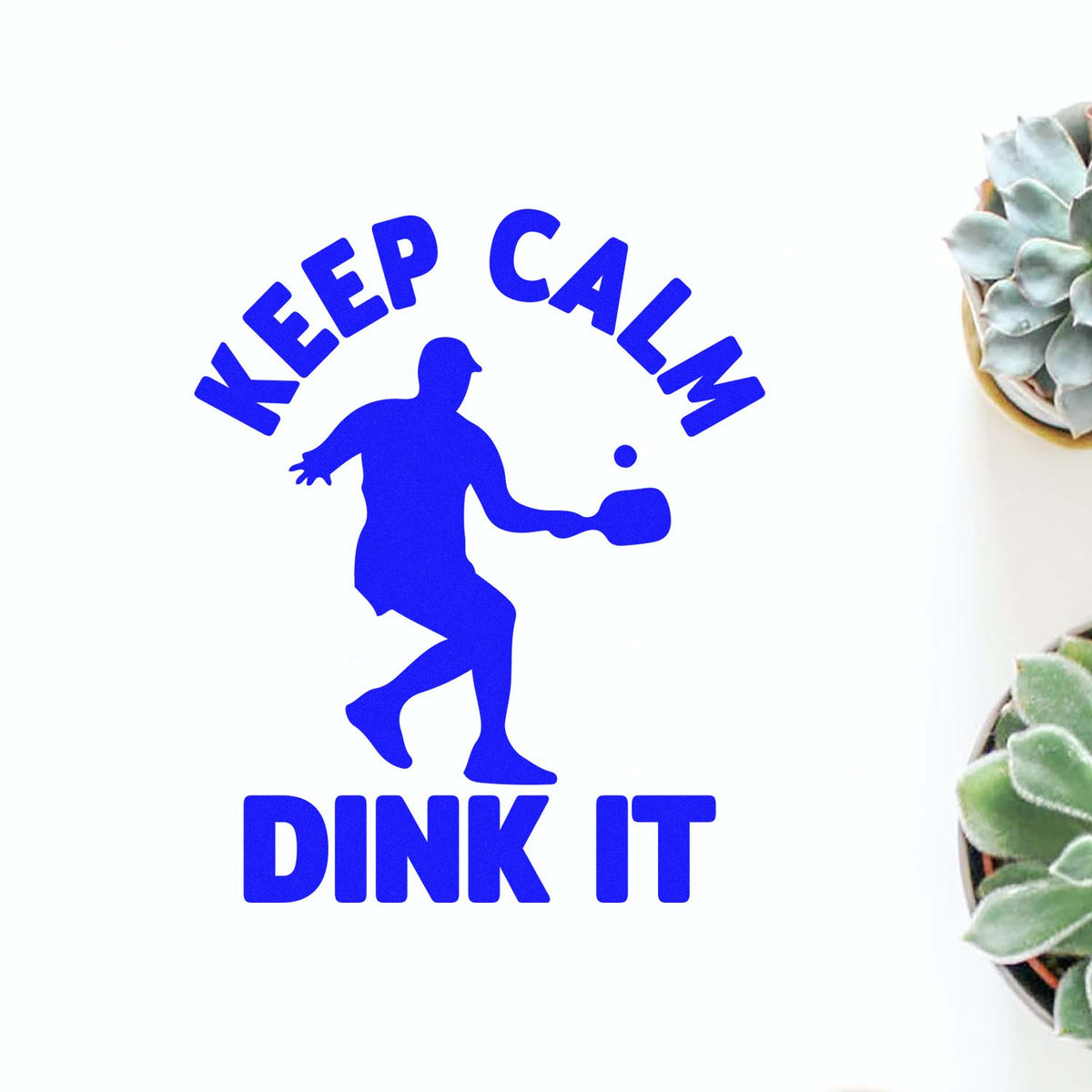 Blue Keep Calm Dink It pickleball stamp and seal design with player silhouette on a white background.