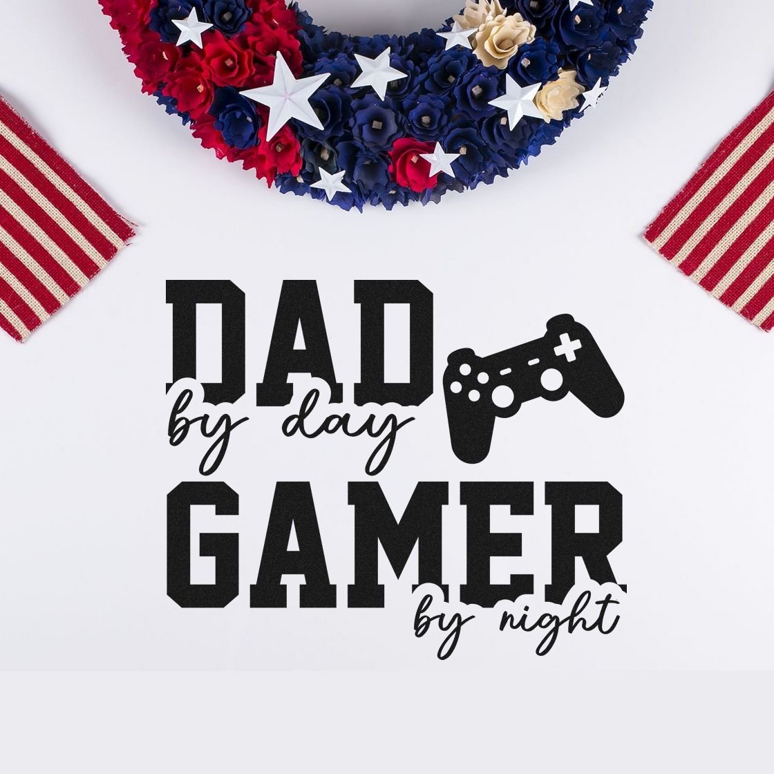 Dad and gamer stamp and seal in black with red, white, and blue stars, stripes, flowers, and a game controller.