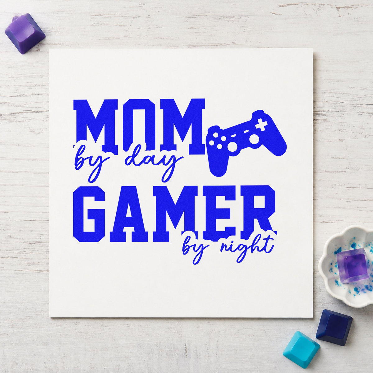 Mom Day Gamer Night craft stamp in blue ink on cardstock, an easy option for blanket corner printing.