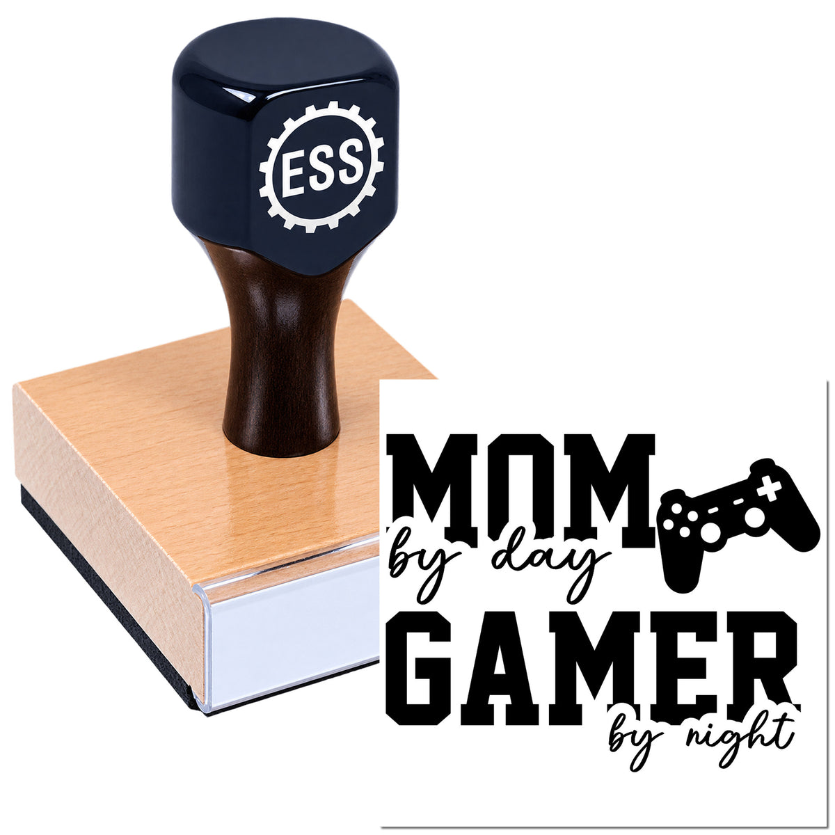 Navy ESS rubber stamp on wooden block, with black "Mom by day Gamer by night" seal and game controller.