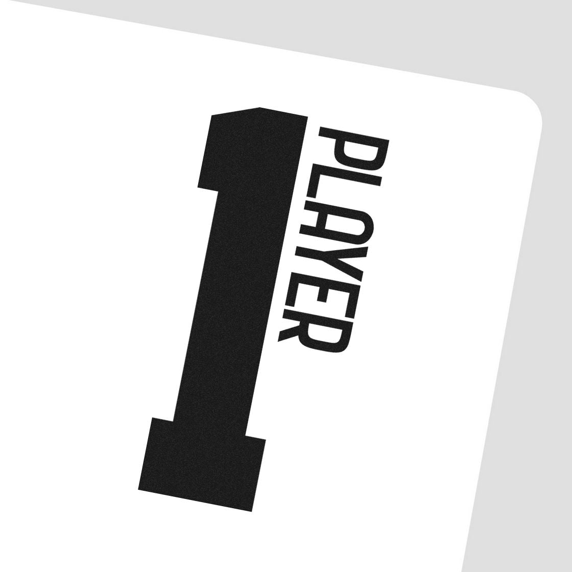 Black Player 1 stamp and seal design on white card, tilted on light gray background