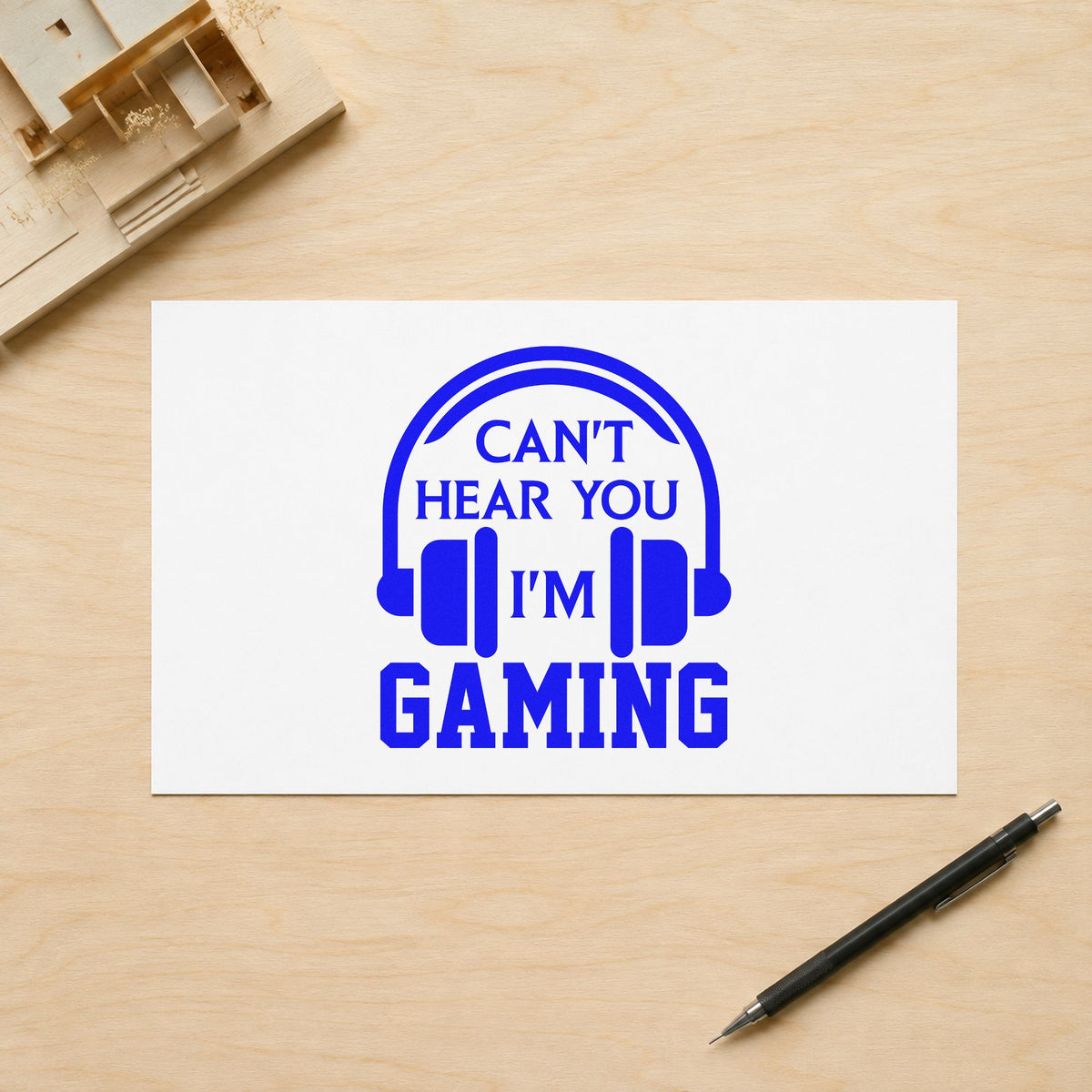 Cannot Hear You Gaming craft stamp imprinted in blue ink on paper, a design suited to framed bedroom door.