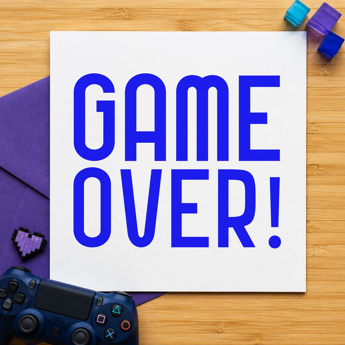 Game Over Tall Lettering craft stamp imprinted in blue ink on paper, a design suited to framed game room.